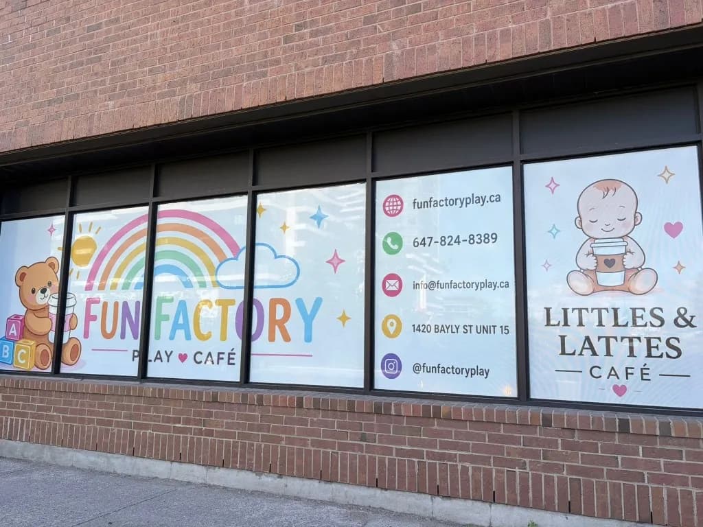 Indoor playground with slides and climbing nets at Fun Factory