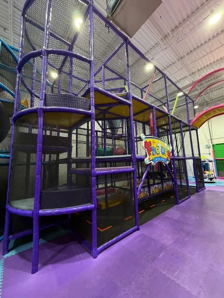 Tube slides and play structure at Fun Factory Play Café