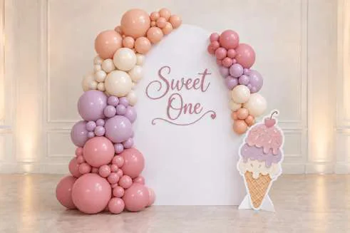 Single backdrop with full and half balloon garlands plus themed cutout